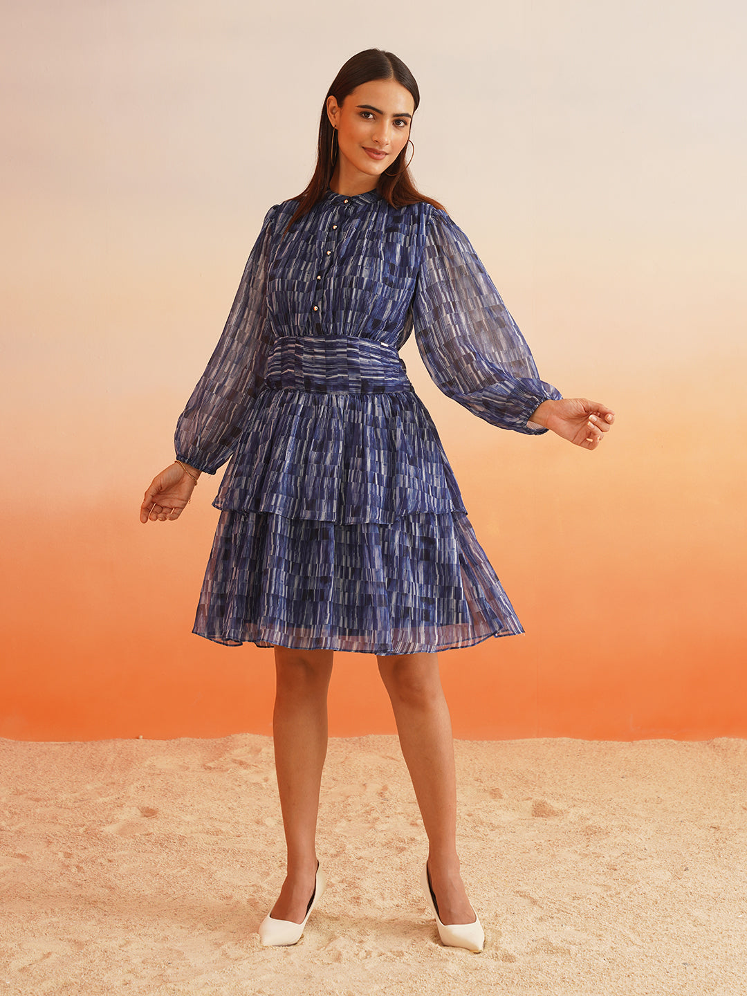 Rhythmic Ruffles Groove into Chic with Abstract Blue Dress