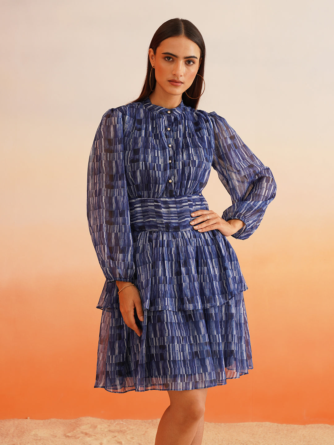 Rhythmic Ruffles Groove into Chic with Abstract Blue Dress